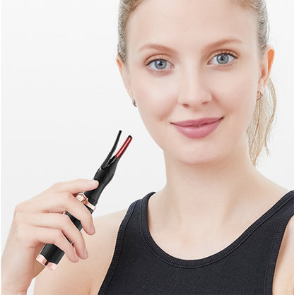 Heated Eyelash Curling Wand in use